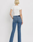 High Rise Slant Hem Flare Jeans