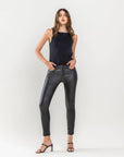 Mid Rise Coated Skinny Jeans